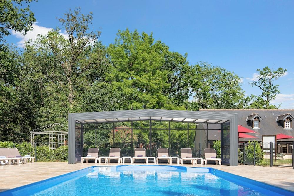 أوتل ريليه ديه لاند - ديموري إيه شاتو حمام سباحة مكشوف