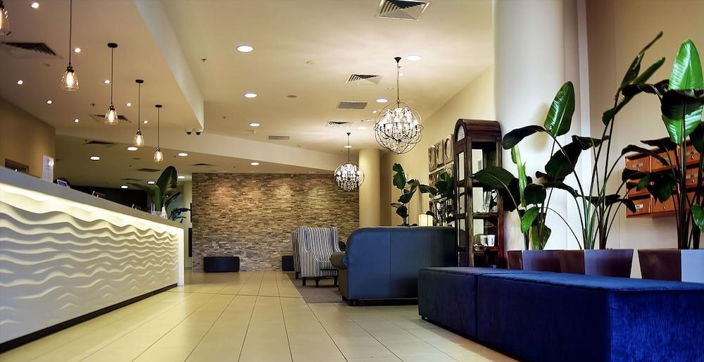 بايز هوليدايز - إيتتالونج بيتش بريميوم أبارتمنتس الردهة