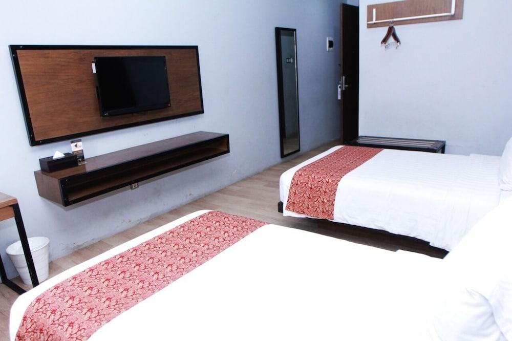 جراند كانجن هوتل أوريب سوموهارجو يوجياكارتا غرفة