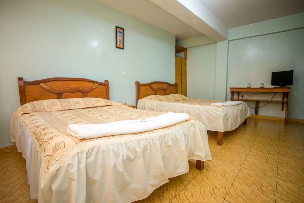 سلوبز فيلا هوتل غرفة