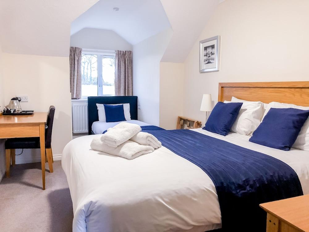 ذا آنجل هوتل غرفة