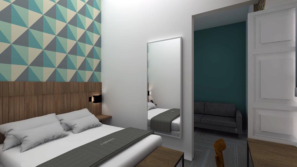 كارلوتا ساستينابل ديزاين هوتل غرفة