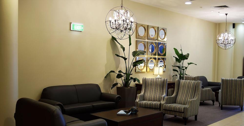 بايز هوليدايز - إيتتالونج بيتش بريميوم أبارتمنتس منطقة الجلوس في الردهة