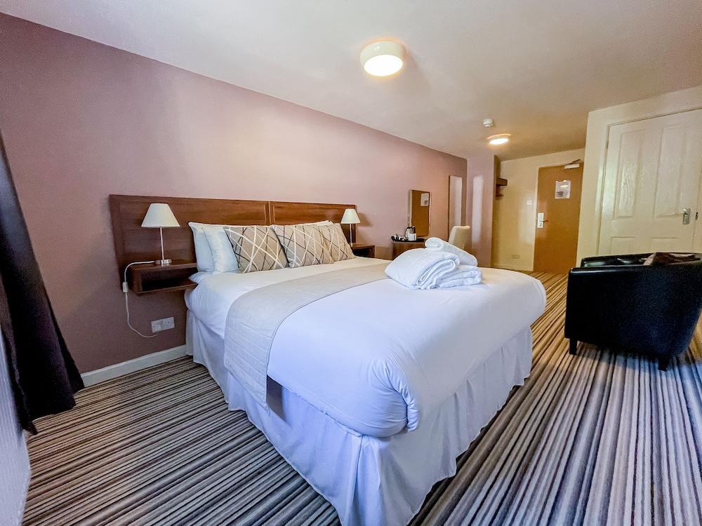 ذا آنجل هوتل غرفة